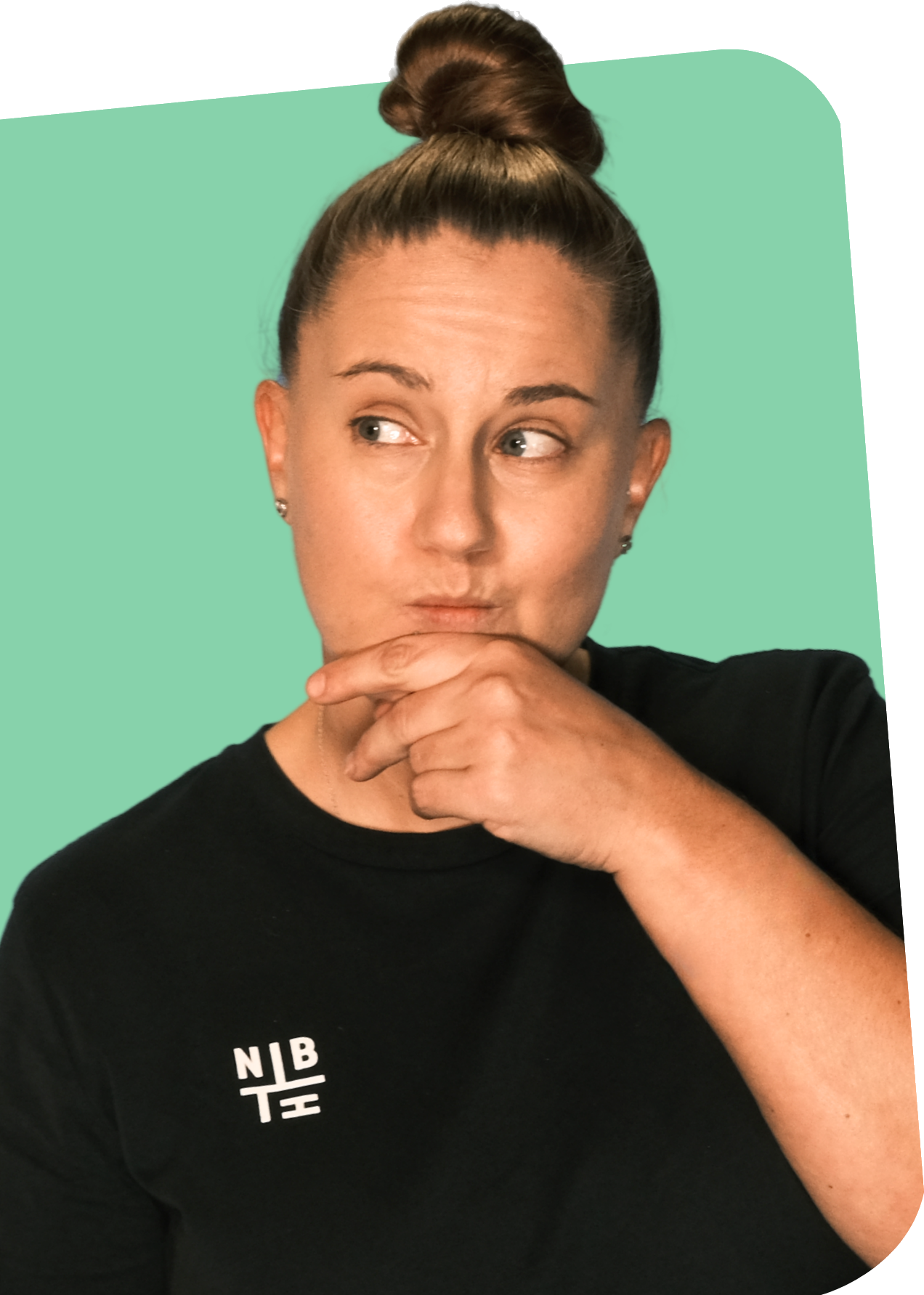 Woman thinking, hand to chin, on a green shape